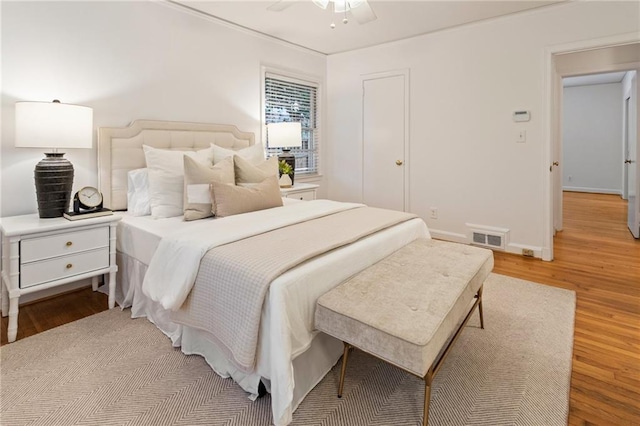 bedroom with light hardwood / wood-style floors