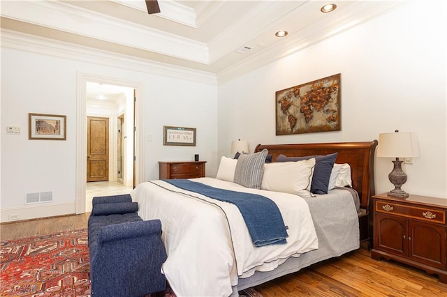 5352 Lacosta Ln, Alpharetta, GA 30022 - bedroom with ornamental molding, wood finished floors, recessed lighting, a raised ceiling, and ensuite bath