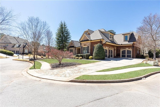 5352 Lacosta Ln, Alpharetta, GA 30022 - view of front of house with brick siding, curved driveway, and an attached garage