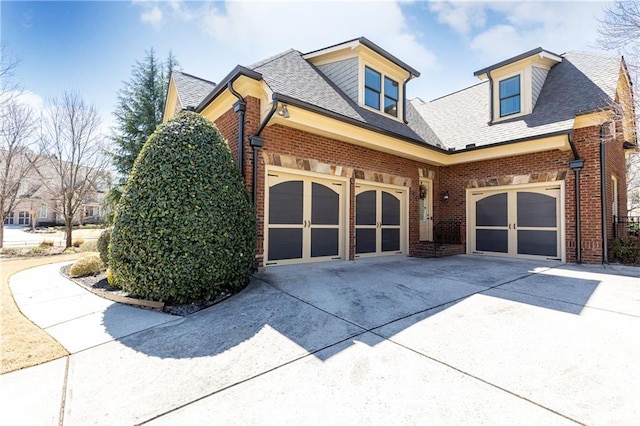 5352 Lacosta Ln, Alpharetta, GA 30022 - view of side of home with driveway, brick siding, an attached garage, and roof with shingles