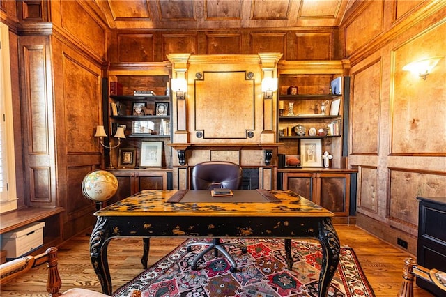 5352 Lacosta Ln, Alpharetta, GA 30022 - home office with wooden walls, built in features, wood finished floors, and a decorative wall