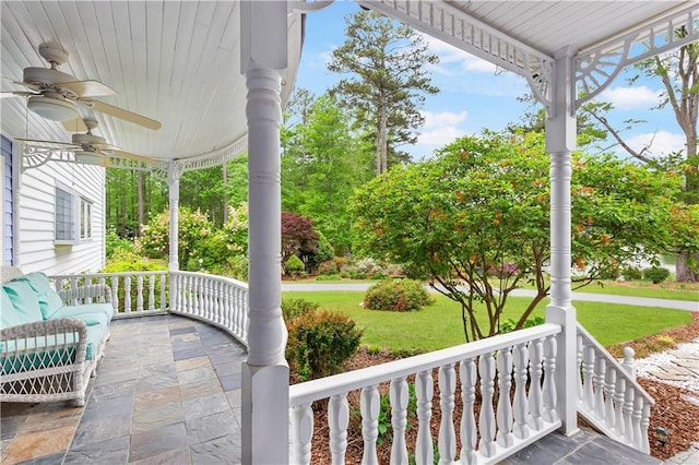 view of patio / terrace with a ceiling fan and a porch