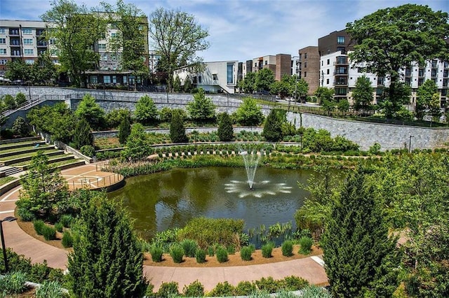 view of home's community with a water view