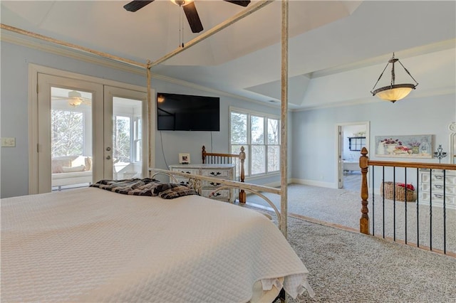 bedroom featuring carpet floors, a tray ceiling, french doors, crown molding, and baseboards