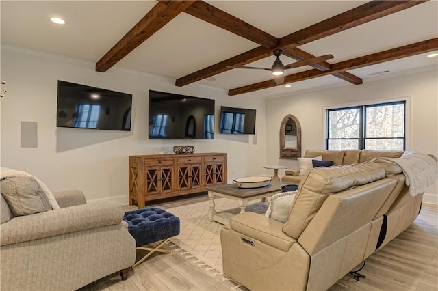 living room with light wood finished floors, baseboards, beam ceiling, and recessed lighting