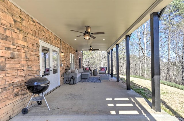 view of patio with a ceiling fan, french doors, a grill, and an outdoor hangout area