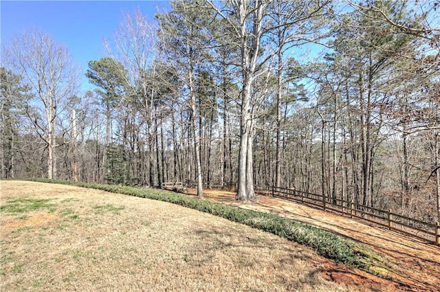 view of yard with a forest view