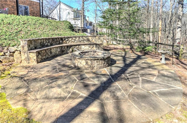 view of patio / terrace featuring a fire pit