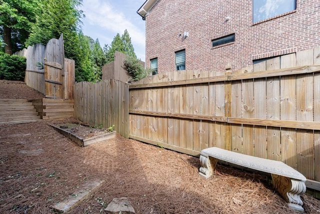 view of yard featuring fence