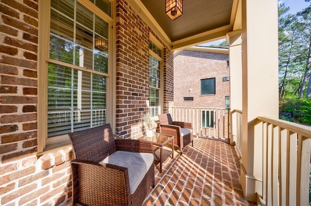 balcony featuring a porch