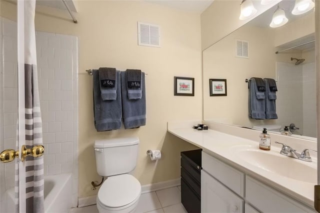 bathroom featuring toilet, visible vents, tile patterned flooring, and vanity