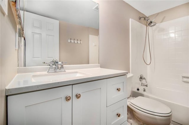 full bathroom featuring vanity, shower / bathing tub combination, and toilet