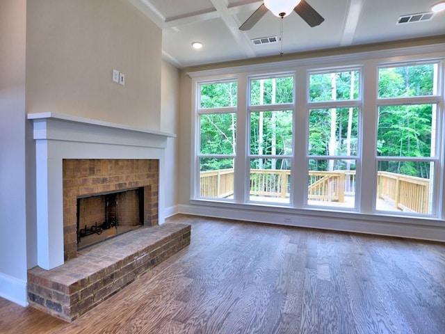 3730 Reserve Overlook Way, Cumming, GA 30041 - unfurnished living room with a ceiling fan, baseboards, wood finished floors, and a fireplace