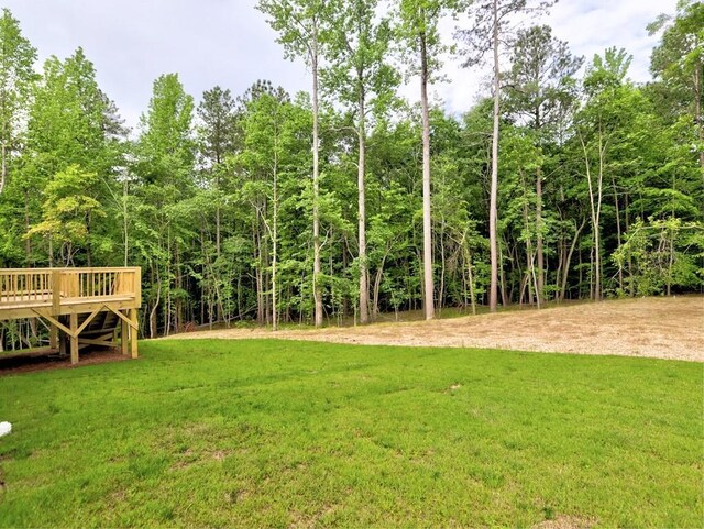 3730 Reserve Overlook Way, Cumming, GA 30041 - view of green lawn with a deck