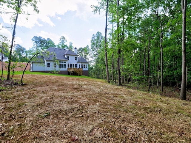 3730 Reserve Overlook Way, Cumming, GA 30041 - back of property with a chimney
