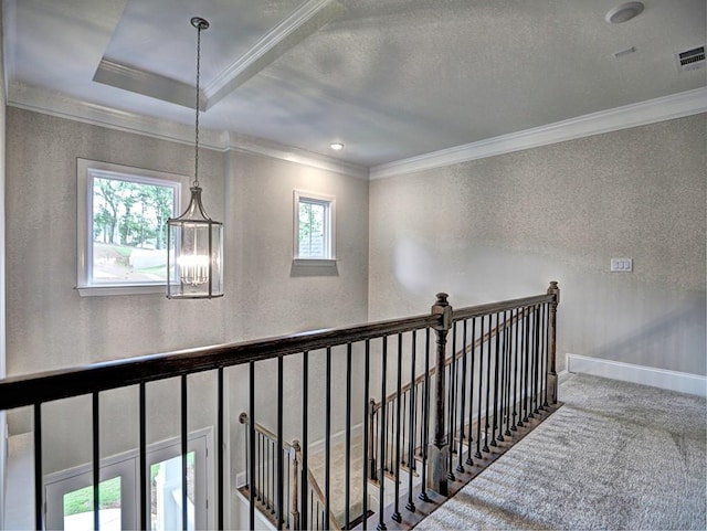 3730 Reserve Overlook Way, Cumming, GA 30041 - hallway with ornamental molding, an upstairs landing, a textured wall, a chandelier, and carpet flooring