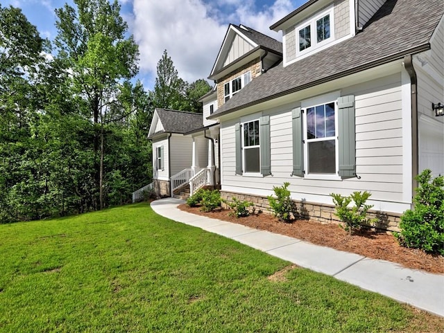 3730 Reserve Overlook Way, Cumming, GA 30041 - view of side of property with a lawn, a garage, and roof with shingles