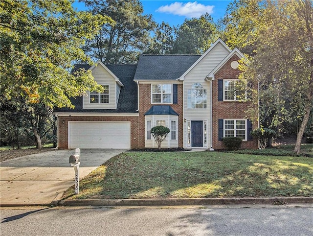 view of front facade featuring a garage and a front lawn