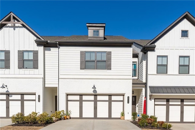 view of front of home with a garage