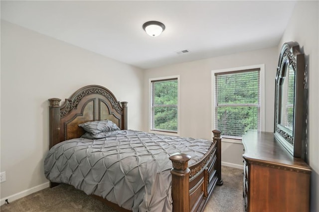 bedroom featuring carpet, visible vents, and baseboards