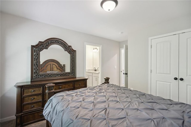 bedroom with a closet and connected bathroom