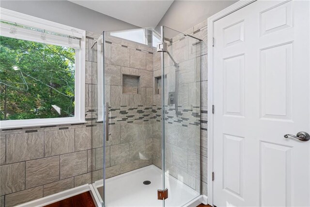 bathroom featuring a stall shower