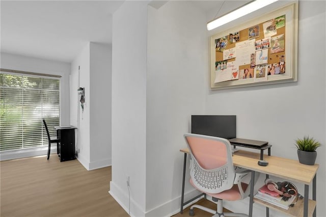 office area with light wood-type flooring