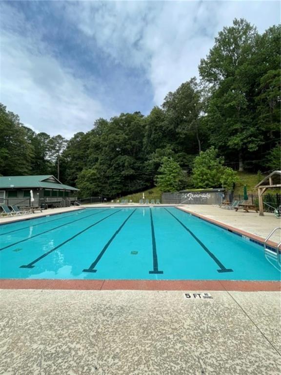 view of pool featuring a gazebo and a patio