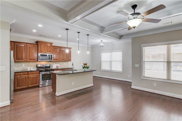 kitchen featuring stainless steel appliances, dark wood-style flooring, decorative backsplash, brown cabinetry, and dark countertops