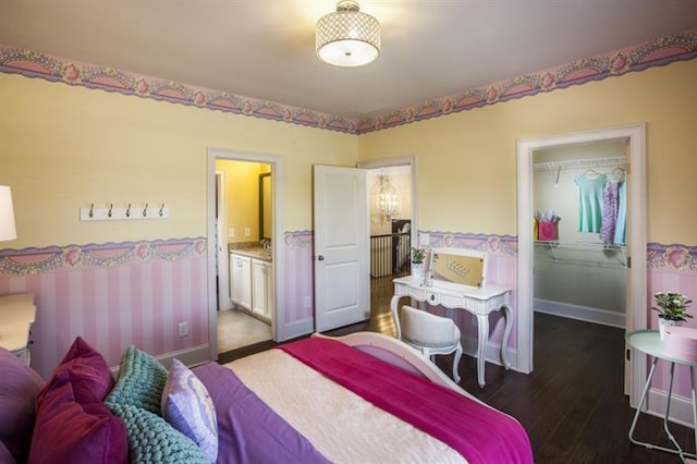 bedroom featuring dark hardwood / wood-style floors and a closet