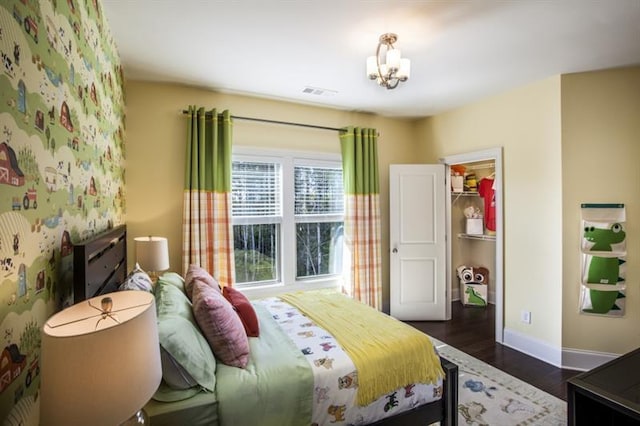 bedroom featuring dark hardwood / wood-style flooring