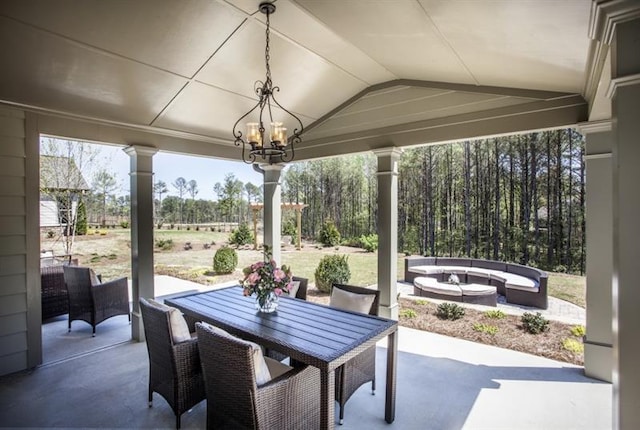 view of patio / terrace with an outdoor fire pit