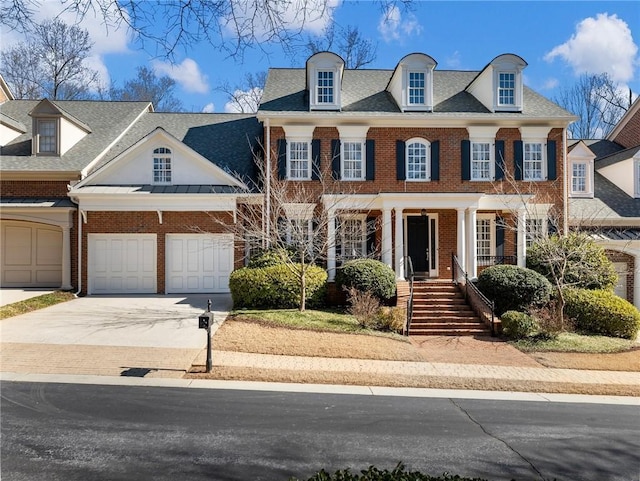 colonial house featuring a garage