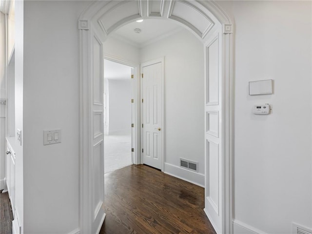 hallway featuring dark wood-type flooring