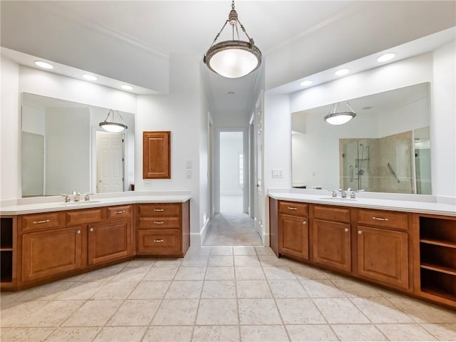 bathroom featuring vanity and tiled shower