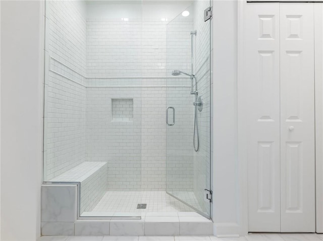 bathroom with an enclosed shower