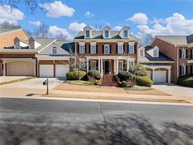 view of front of property with a garage and covered porch