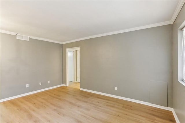 91 Rumson Rd NE Unit B25, Atlanta, GA 30305 - spare room with light wood-style flooring, ornamental molding, and baseboards