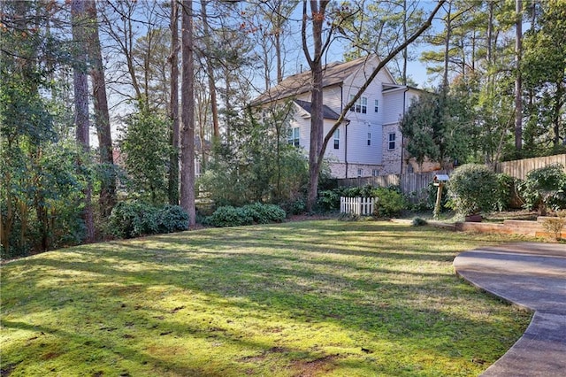 view of yard featuring fence