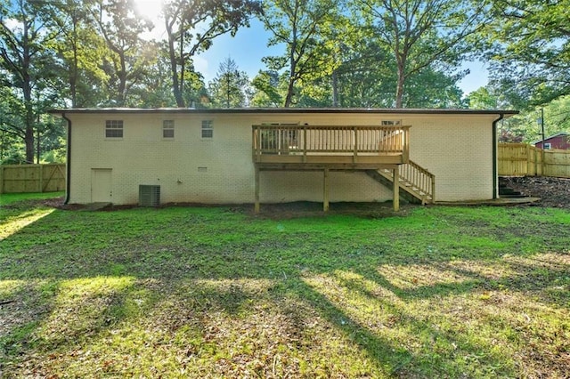 rear view of property with stairs, a deck, brick siding, cooling unit, and crawl space