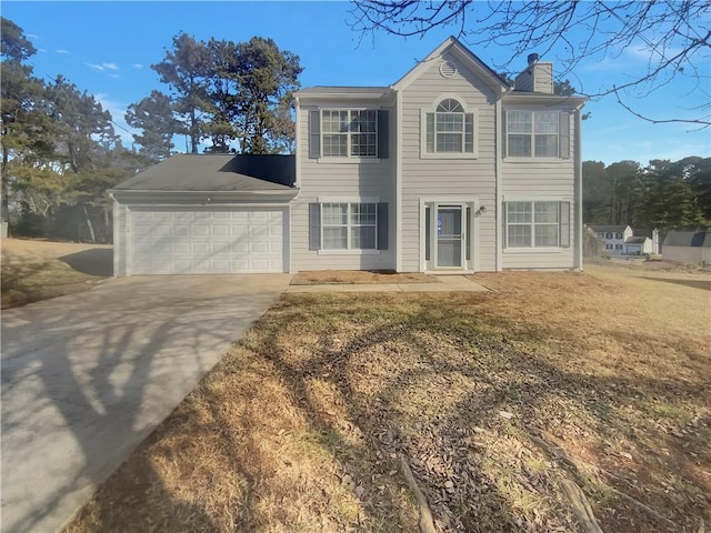 colonial home with a garage