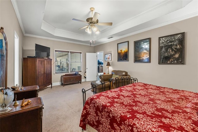 carpeted bedroom with crown molding, a raised ceiling, visible vents, a ceiling fan, and baseboards