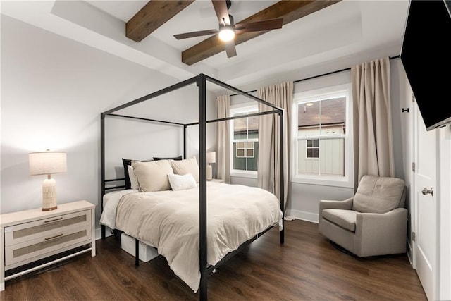 bedroom featuring beam ceiling, ceiling fan, and dark hardwood / wood-style flooring