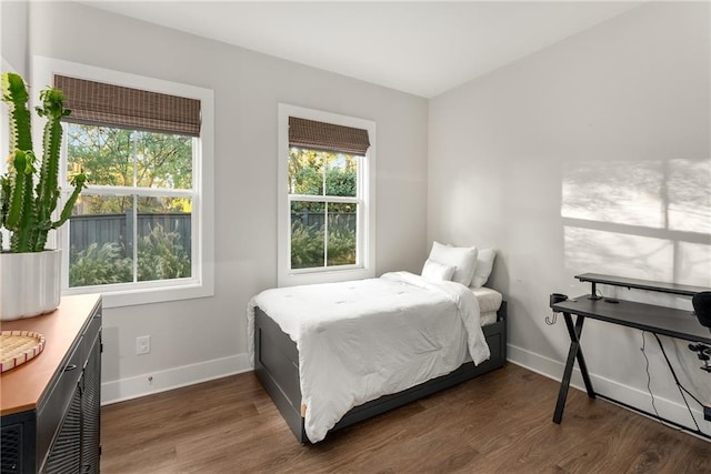 bedroom featuring dark hardwood / wood-style floors