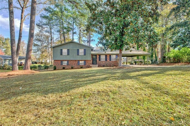 split level home with a carport and a front lawn