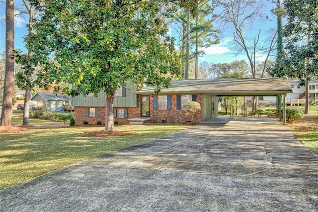 view of front of house with a carport and a front lawn