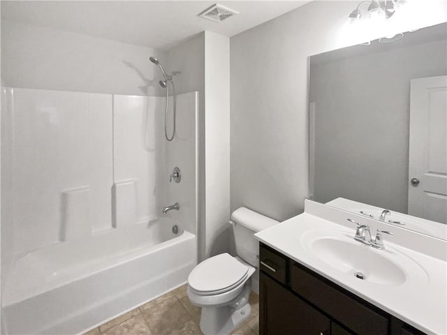 full bathroom with washtub / shower combination, vanity, toilet, and tile patterned flooring