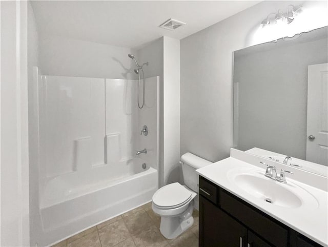 full bathroom featuring vanity, washtub / shower combination, and toilet