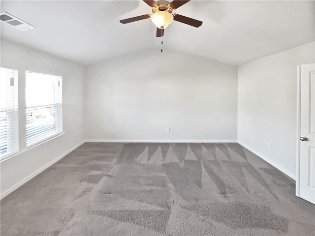 unfurnished room with ceiling fan, carpet, and lofted ceiling