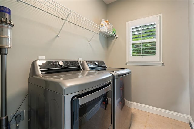 1758 Rosehedge Way NW, Kennesaw, GA 30152 - washroom featuring washing machine and clothes dryer, baseboards, and light tile patterned floors